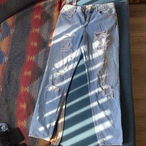 Torn denim jeans